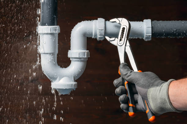 Professional Drain Cleaning technician working in Arlington, MA